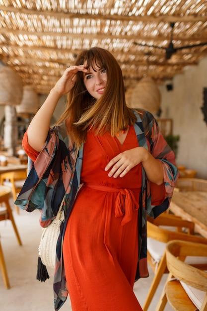 orange and burgundy outfit