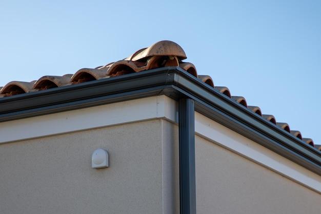 pros and cons of gutters on a house